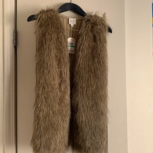 Faux fur vest sweater knit back . Soft faux fur. Brown, tan and even some black